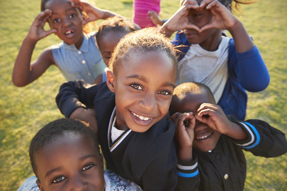 Elementary school kids having fun outdoors, high angle